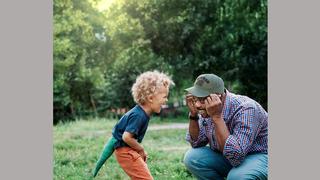 Little boy and his military veteran father